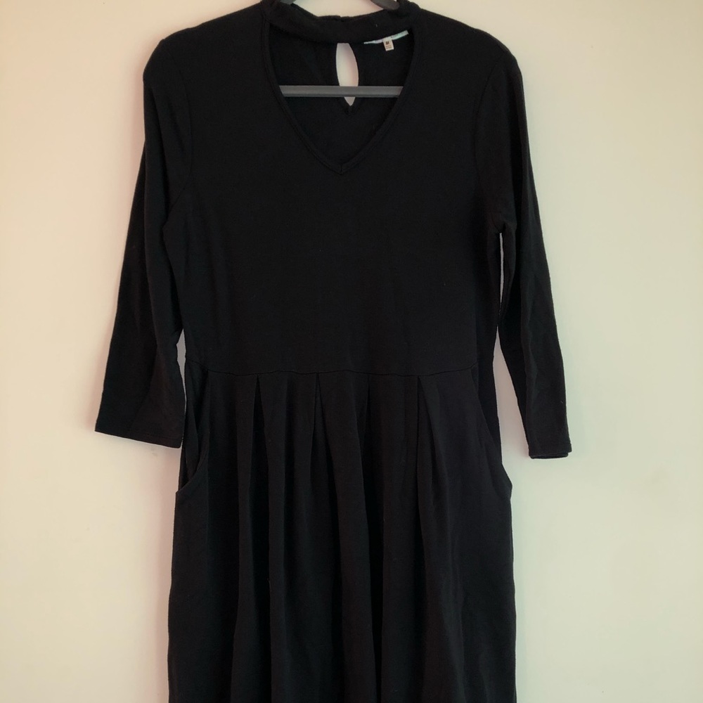 black dress with cutout neck